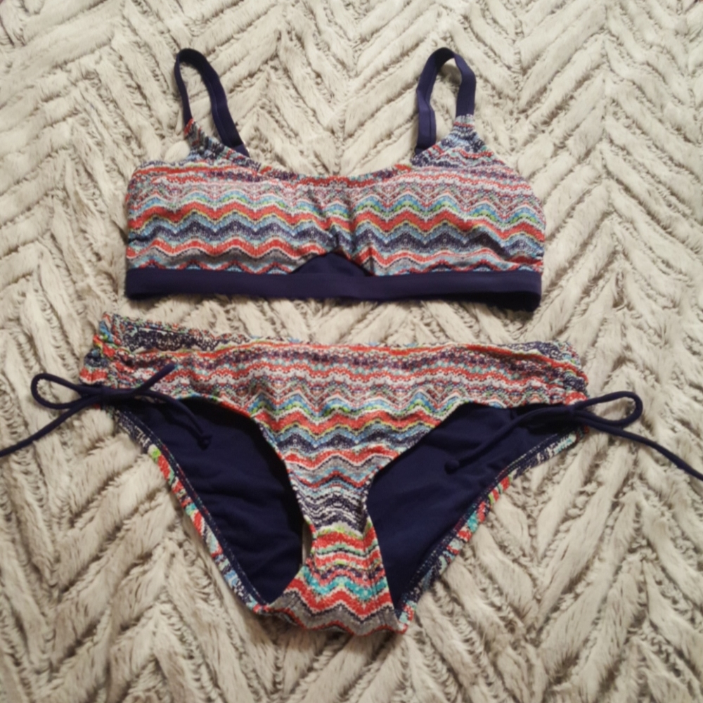 New Never Worn. 2 Piece Swim Suit